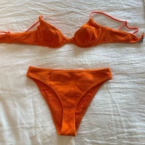 such a cute orange terry cloth bikini!